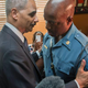U.S. Attorney General Eric Holder talks with Capt. Ron Johnson of the Missouri State Highway Patrol at Drake's Place Restaurant Aug. 20, 2014, in Ferguson, Mo.
Pablo Martinez Monsivais-Pool/Getty Images